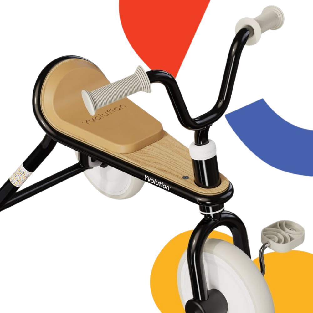 Children's tricycle with wooden seat and black frame on a colorful background