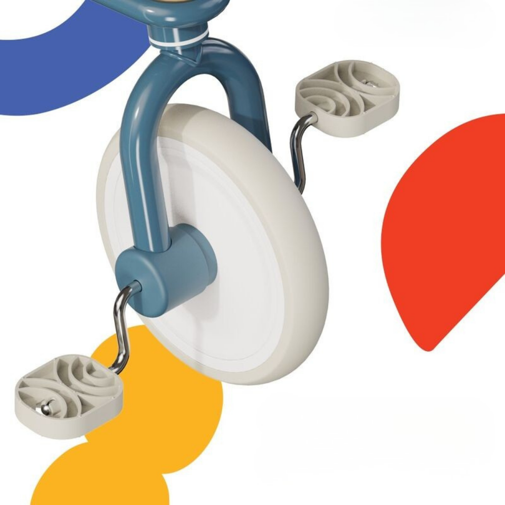 Toy tricycle with colorful abstract shapes on a white background