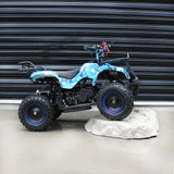 MJM 49cc Petrol Powered 2-Stroke Farm Kids ATV Quad Bike displayed on the white solid rough stone